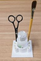 Glue holder for small cups or bottles